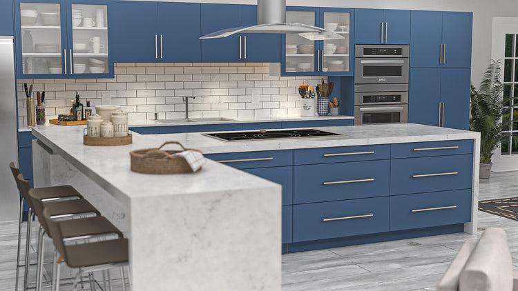 a kitchen with blue cabinets and white counter tops